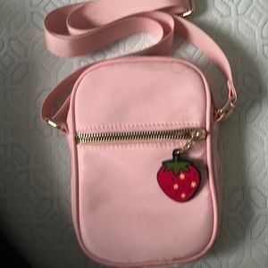 Small two pocket purse with strawberry keychain used a couple times